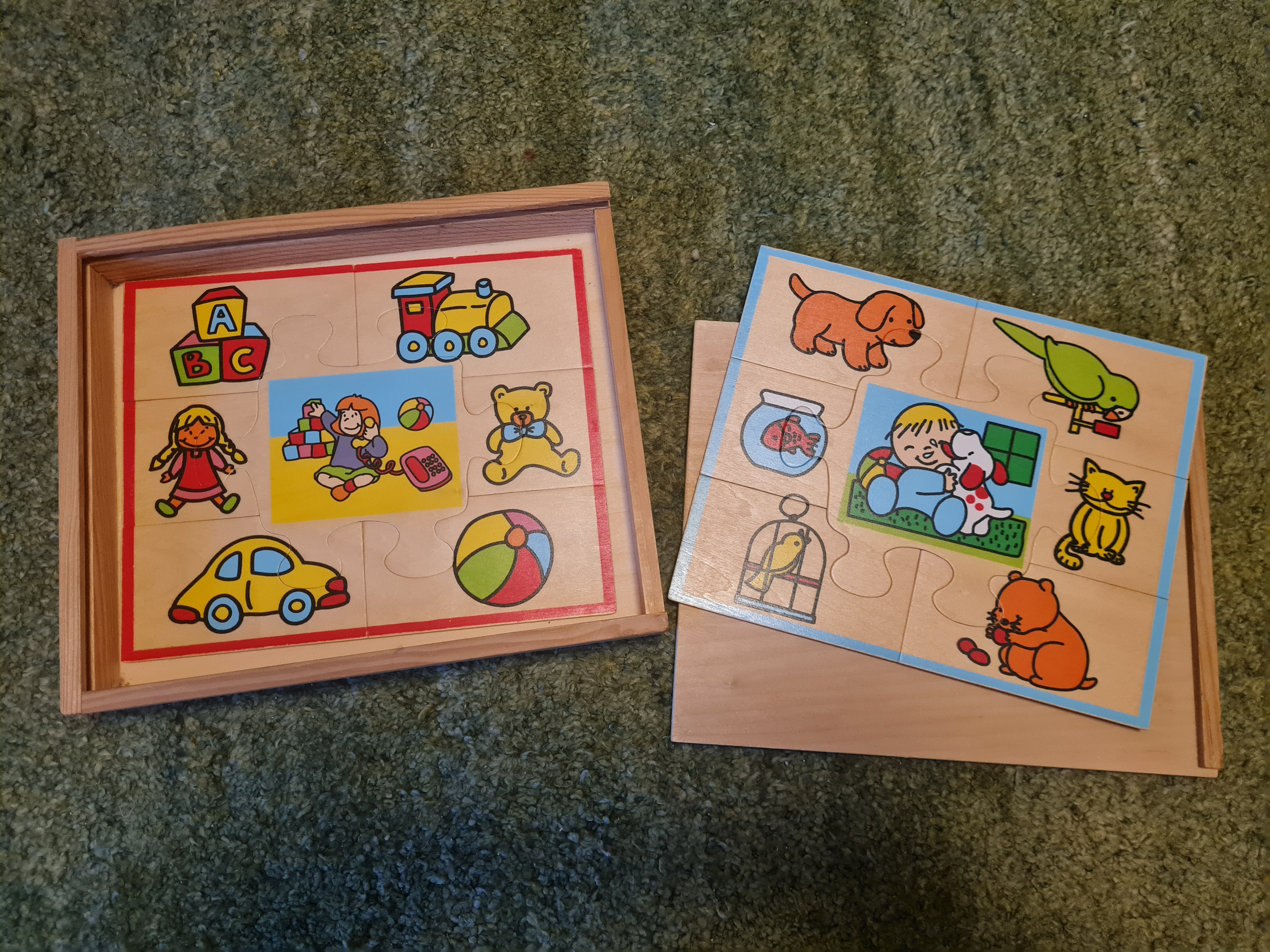 Holzbox mit 2 Holzpuzzles, je 7 Teile